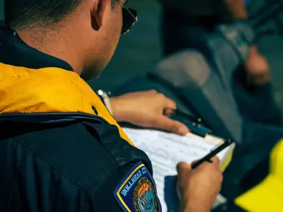 boating officer writing a ticket