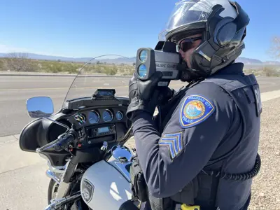 traffic officer checking for speeders