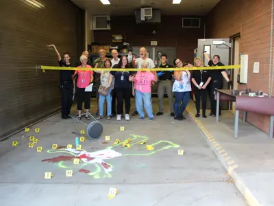 citizens police academy at a mock crime scene