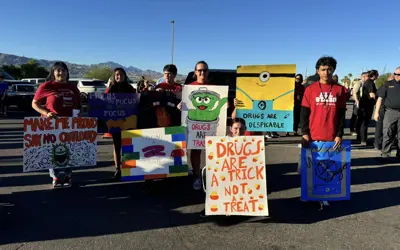 teens with anti-drug posters