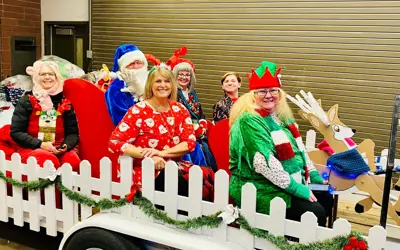 volunteers on a sanat sleigh