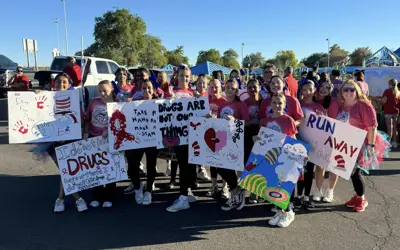 Kids with anti-drug posters