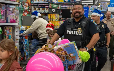 officer shopping with children