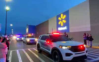 patrol cars in front of Walmart