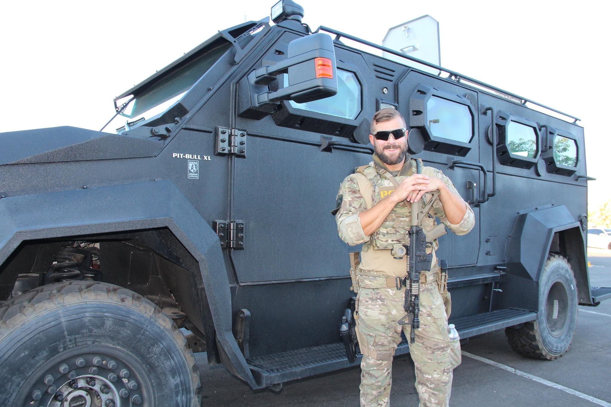 swat officer and swat truck